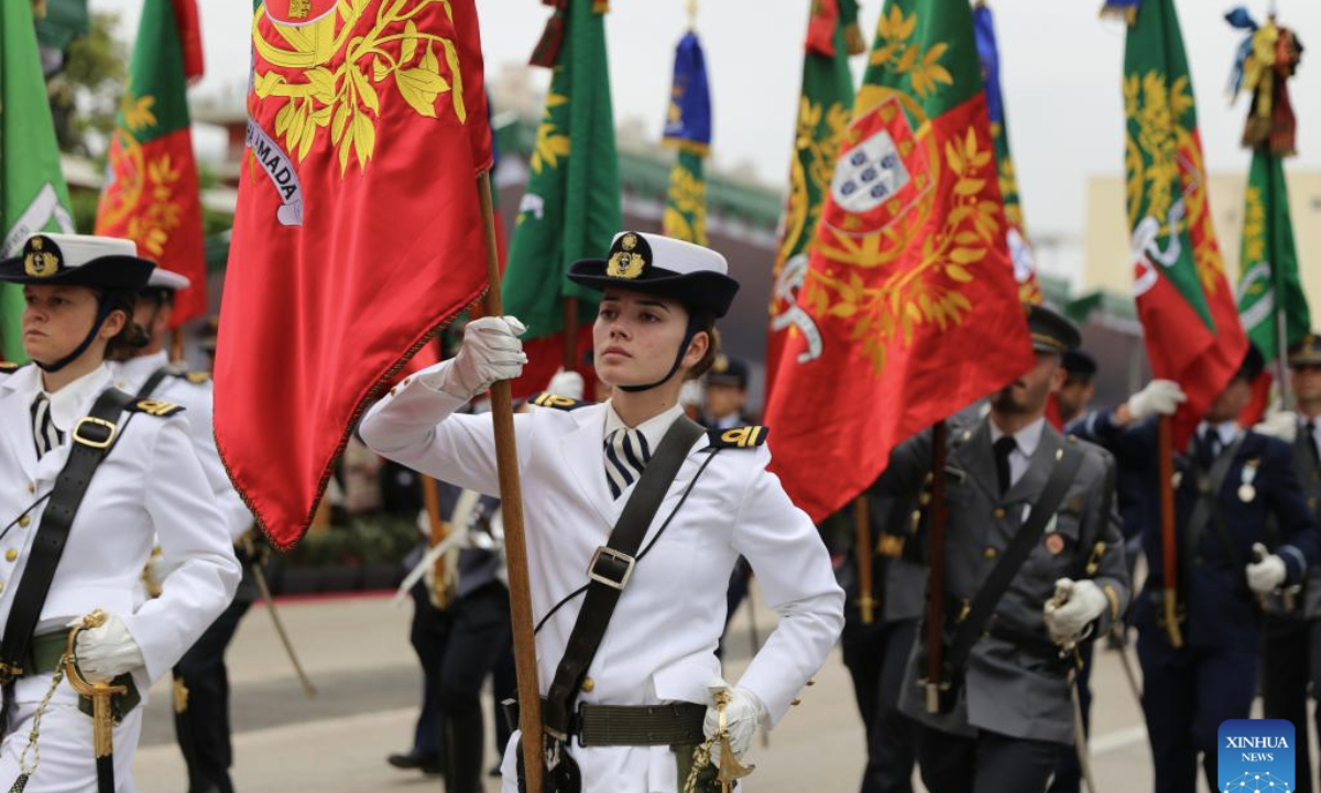 Soldiers take part in a military parade to mark Portugal Day in Lagos, Portugal, on June 10, 2025. (Xinhua/Xun Wei)