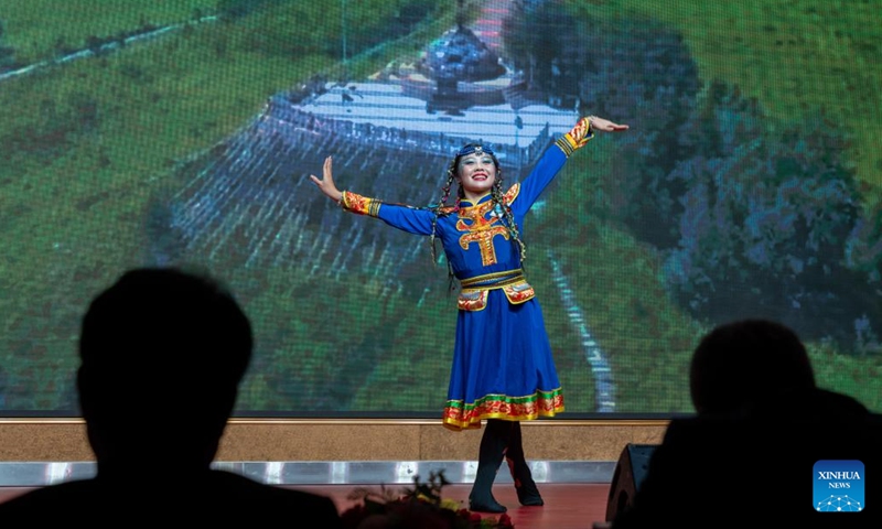A contestant performs during the Lao Regional Final of the 24th Chinese Bridge Chinese Proficiency Competition for Foreign College Students in Vientiane, Laos, June 6, 2025. (Photo: Xinhua)