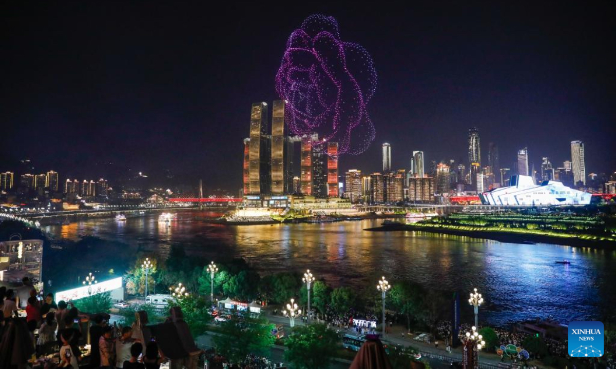 A drone light show is pictured in Nan'an District of southwest China's Chongqing Municipality, April 19, 2025. The 15-minute drone light show, which features iconic city landmarks of Chongqing, made its debut on Saturday, presenting a visual feast along with a city lighting display. Photo: Xinhua