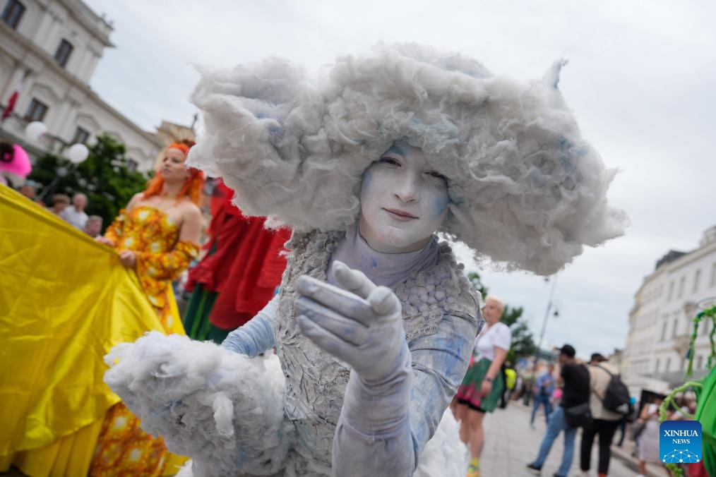 A performer dressed in a cloud-inspired costume takes part in the Mermaid Parade in Warsaw, Poland, June 7, 2025. The parade, featuring 20 floats, was held in the Polish capital on Saturday to honor the Warsaw Mermaid, an iconic symbol of the city. (Photo: Xinhua)
