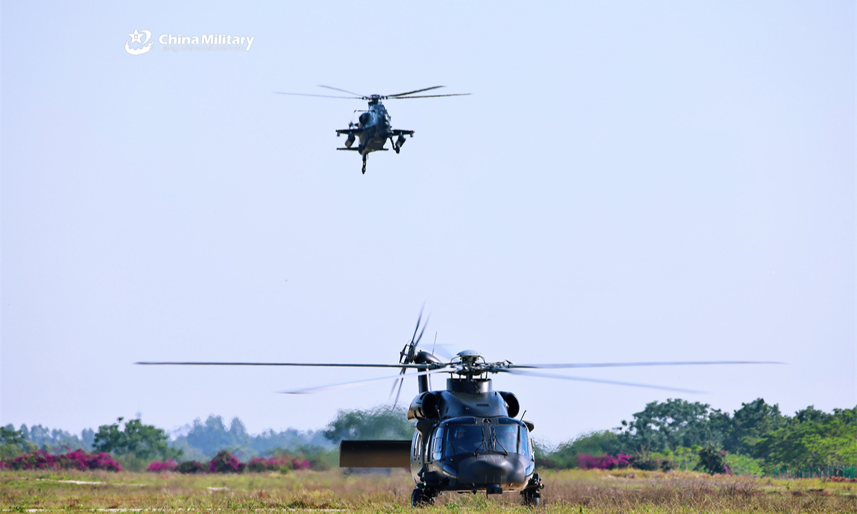A group of helicopters attached to an army aviation brigade under the Chinese PLA 75th Group Army lift off successively for a flight training exercise in late May, 2025. (eng.chinamil.com.cn/Photo by Cao Yiqing)