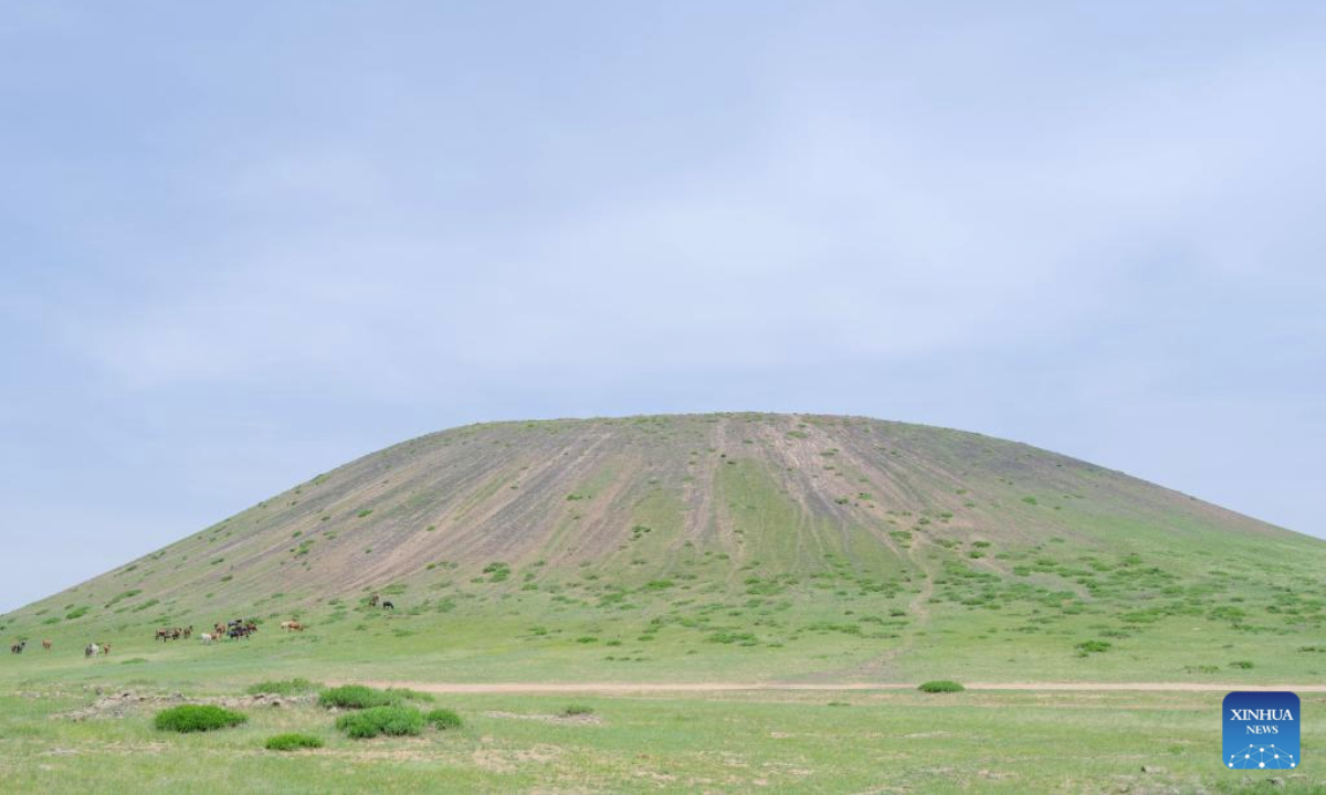 This photo taken on June 17, 2025 shows a volcano of the Ulanhada volcano cluster, Qahar Right Wing Rear Banner of Ulanqab, north China's Inner Mongolia Autonomous Region. The Ulanhada volcano cluster boasts special geological landscapes such as volcanoes and lava landform. With summer's arrival, it has entered the peak tourist season. (Xinhua/Ma Jinrui)