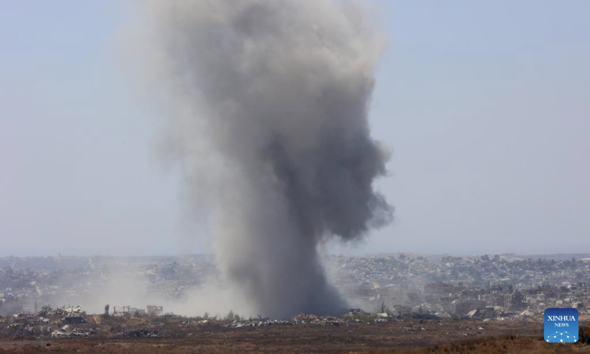 Smoke billows following Israeli strikes in the Gaza Strip, as seen from Israel's southern border with the Gaza Strip, on June 12, 2025. According to the Gaza-based health authorities on Thursday, at least 55,207 Palestinians have been killed, the majority of whom are reported to be women and children. (Photo by Gil Cohen Magen/Xinhua)