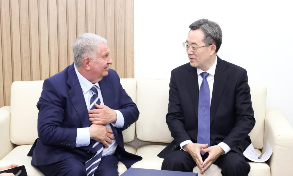 Chinese Vice Premier Ding Xuexiang, also a member of the Standing Committee of the Political Bureau of the Communist Party of China Central Committee, meets with Russian oil company Rosneft's chief executive Igor Sechin on the sidelines of the 28th St. Petersburg International Economic Forum in St. Petersburg, Russia, June 20, 2025. (Xinhua/Pang Xinglei)