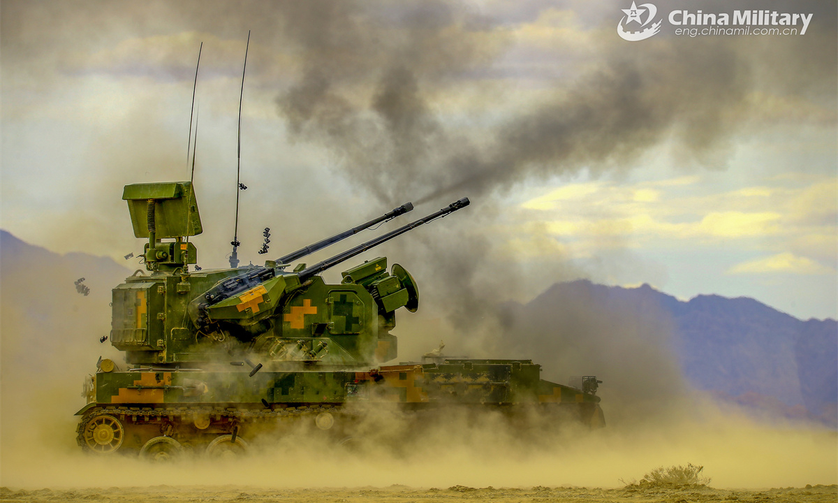 An anti-aircraft gun attached to an anti-aircraft artillery element with the army under the Chinese PLA Eastern Theater Command fires at the mock targets during a live-fire shooting training exercise on June 4, 2025. (eng.chinamil.com.cn/Photo by Zhang Mao)