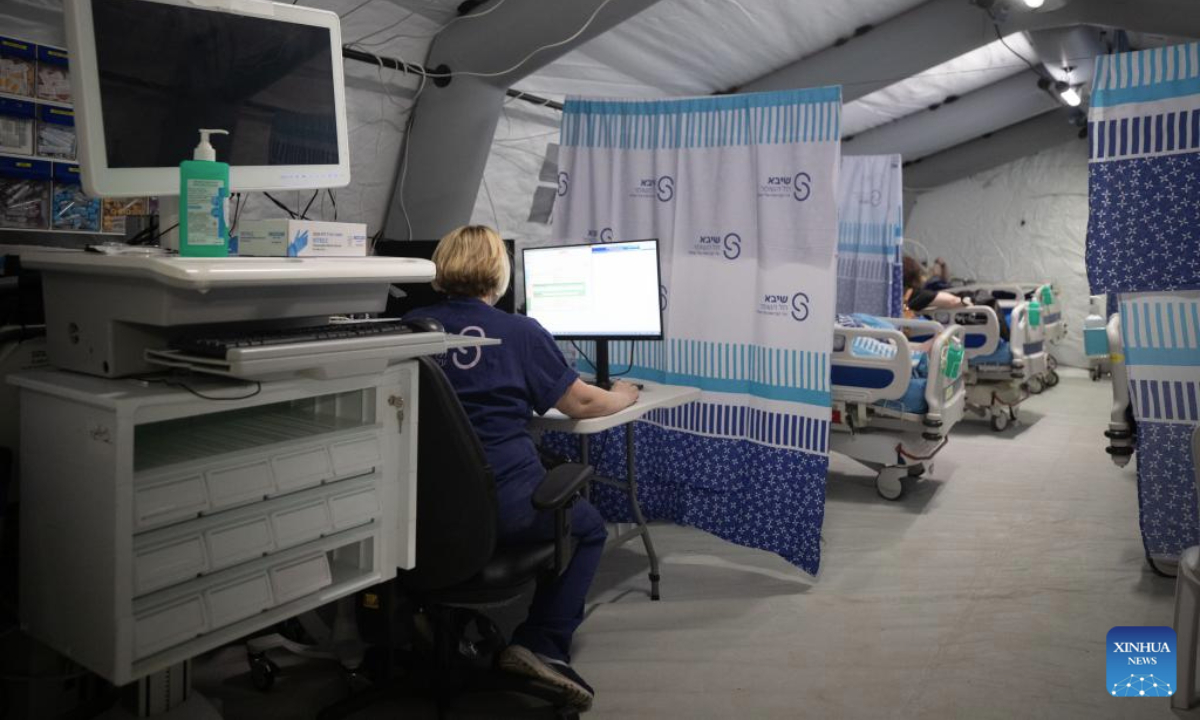 A medical staff member works at an underground wartime medical zone at Sheba Medical Center in Ramat Gan, Israel, June 23, 2025. A wartime medical zone has been established at Sheba Medical Center in Ramat Gan of Israel, amid ongoing missile attacks during the Iran-Israel conflict. The hospital has opened six reinforced units, including five underground and one above-ground facility, designed to offer up to 700 beds and relocate patients and departments from unfortified areas. (Xinhua/Chen Junqing)