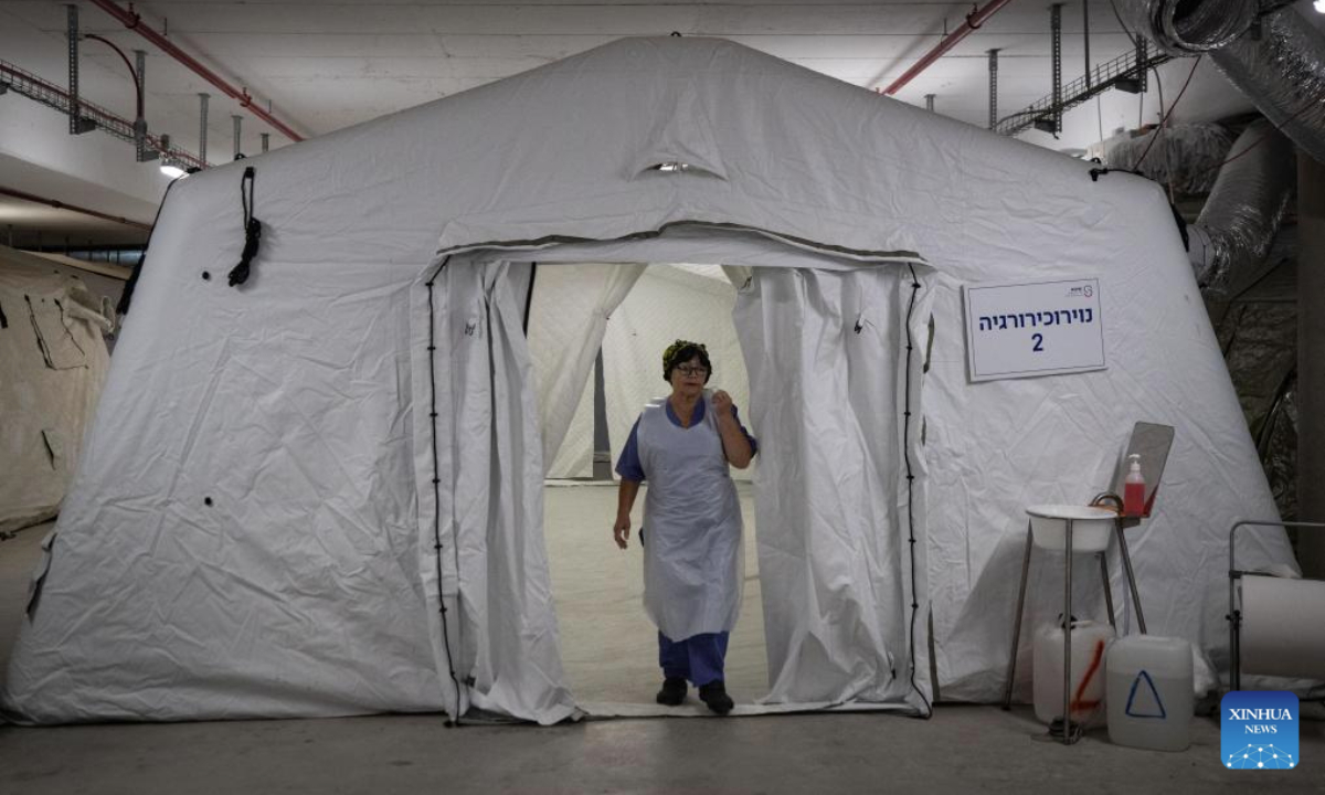 A medical staff member works at an underground wartime medical zone at Sheba Medical Center in Ramat Gan, Israel, June 23, 2025. A wartime medical zone has been established at Sheba Medical Center in Ramat Gan of Israel, amid ongoing missile attacks during the Iran-Israel conflict. The hospital has opened six reinforced units, including five underground and one above-ground facility, designed to offer up to 700 beds and relocate patients and departments from unfortified areas. (Xinhua/Chen Junqing)