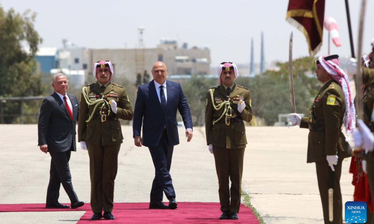 King Abdullah II of Jordan (1st L) welcomes Lebanese President Joseph Aoun (3rd L) at Marka Military Airport in Amman, Jordan, on June 10, 2025. King Abdullah II of Jordan met with visiting Lebanese President Joseph Aoun here on Tuesday to explore ways to deepen bilateral relations and address pressing regional developments, according to a statement released by the Royal Hashemite Court. (Photo by Mohammad Abu Ghosh/Xinhua)