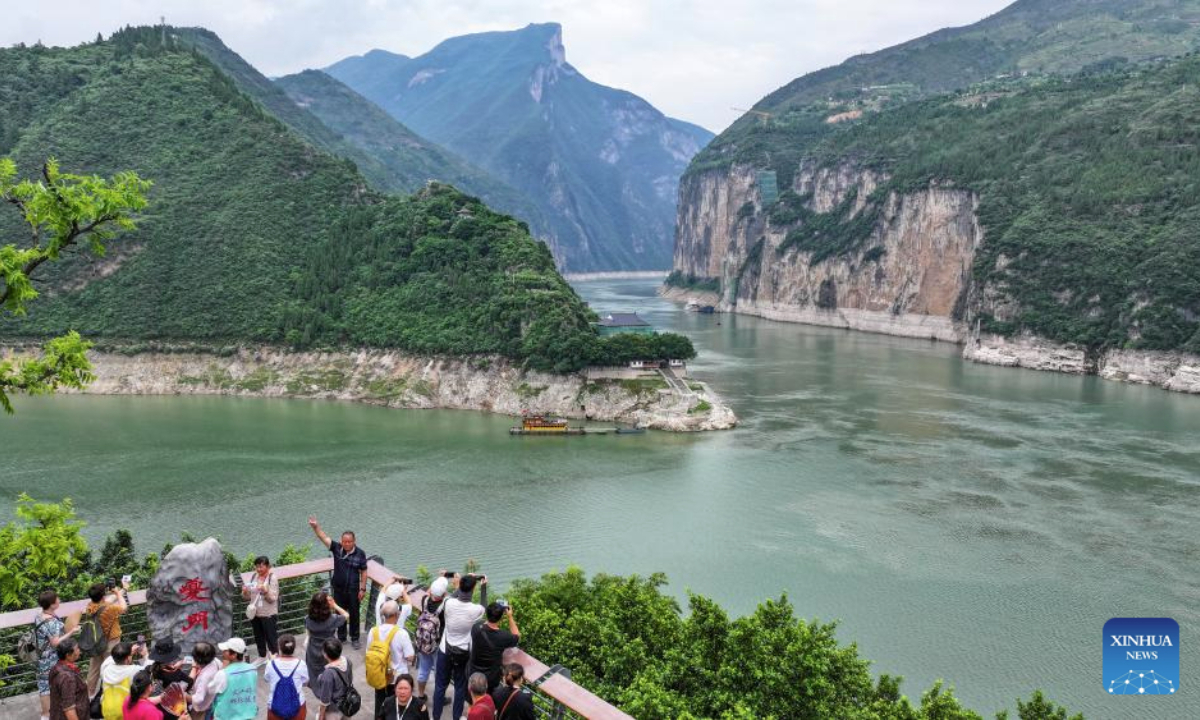 People visit Qutang Gorge, one of the Three Gorges on the Yangtze River, in Fengjie County, southwest China's Chongqing Municipality, June 9, 2025. (Xinhua/Wang Quanchao)