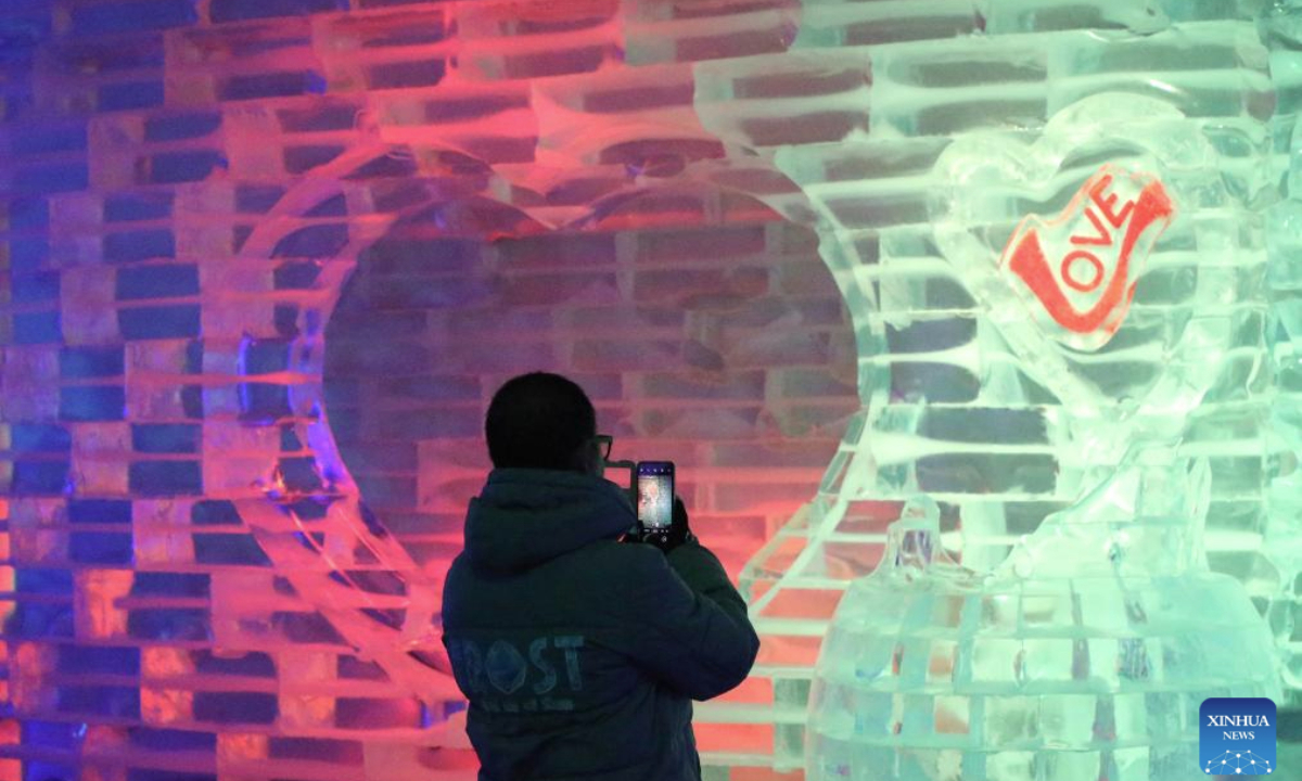 A tourist takes photos at the Frost Magical Ice of Siam in Chonburi Province, Thailand, June 10, 2025. The Frost Magical Ice of Siam, covering an area of 30,000 square meters, is kept at a temperature of minus 10 degrees Celsius. (Xinhua/Rachen Sageamsak)