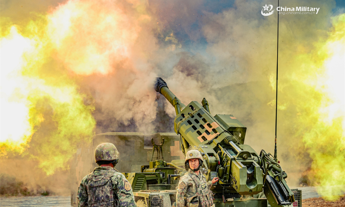 Soldiers assigned to a brigade under the Chinese PLA 75th Group Army fire a PCL-161 122mm truck-mounted howitzer system during a live-fire training exercise on May 27, 2025. (eng.chinamil.com.cn/Photo by Teng Zhaosen)