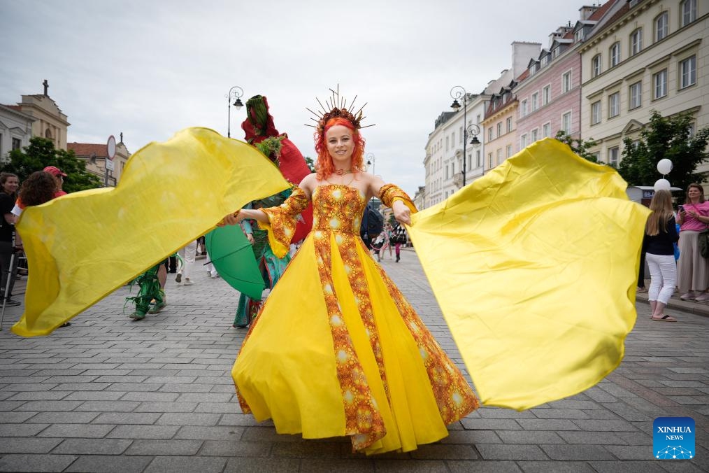 A performer dances during the Mermaid Parade in Warsaw, Poland, June 7, 2025. The parade, featuring 20 floats, was held in the Polish capital on Saturday to honor the Warsaw Mermaid, an iconic symbol of the city. (Photo: Xinhua)
