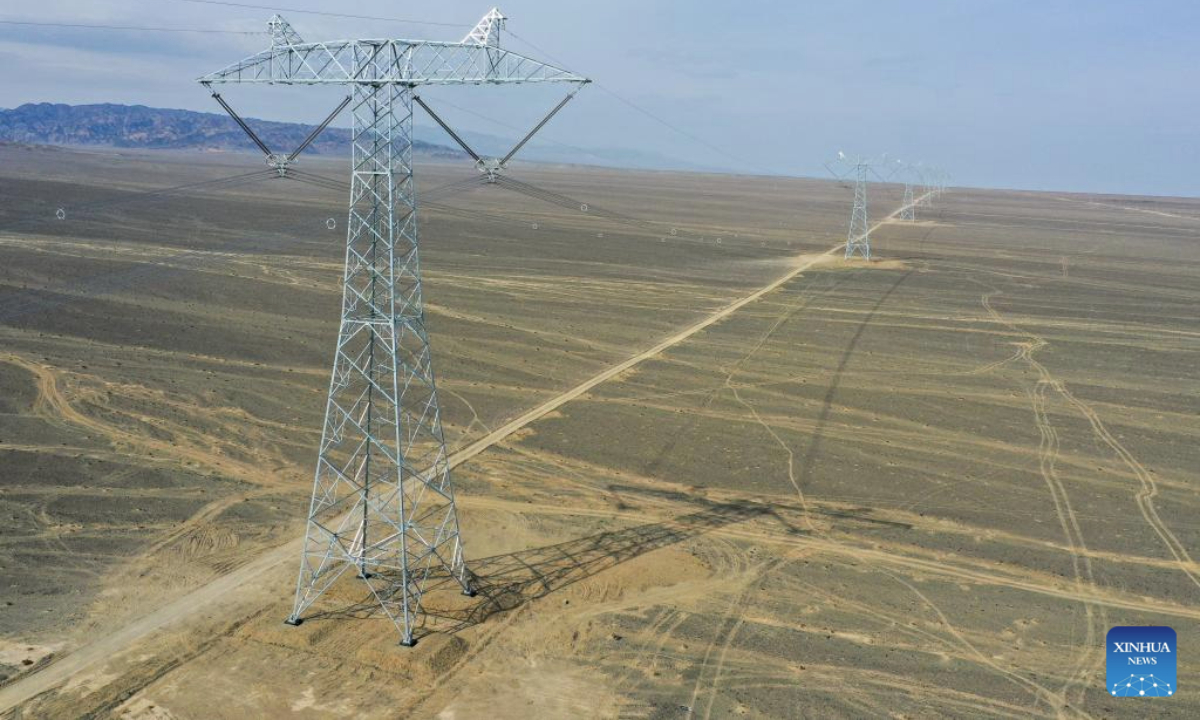 An aerial drone photo shows a view of the Hami-Chongqing ±800 kV ultra-high voltage direct current transmission project, in Hami, northwest China's Xinjiang Uygur Autonomous Region, March 23, 2025. The State Grid Corporation of China on Tuesday announced the operation of the ±800 kV ultra-high voltage direct current transmission project linking eastern Xinjiang's Hami with southwest China's Chongqing Municipality.

This marks China's third major project to transmit electricity from energy-rich Xinjiang Uygur Autonomous Region to other parts of the country. (Xinhua/Ding Lei)