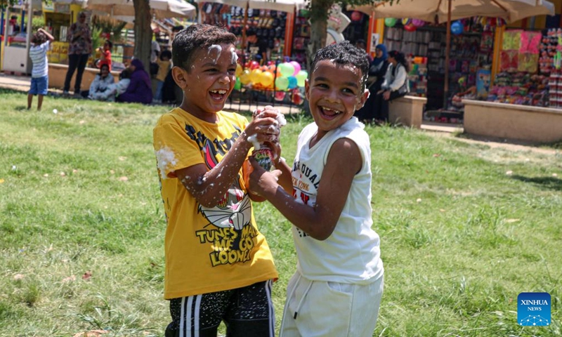 Children have fun at an amusement park during the Eid al-Adha holiday in Cairo, Egypt, on June 8, 2025. (Photo: Xinhua)
