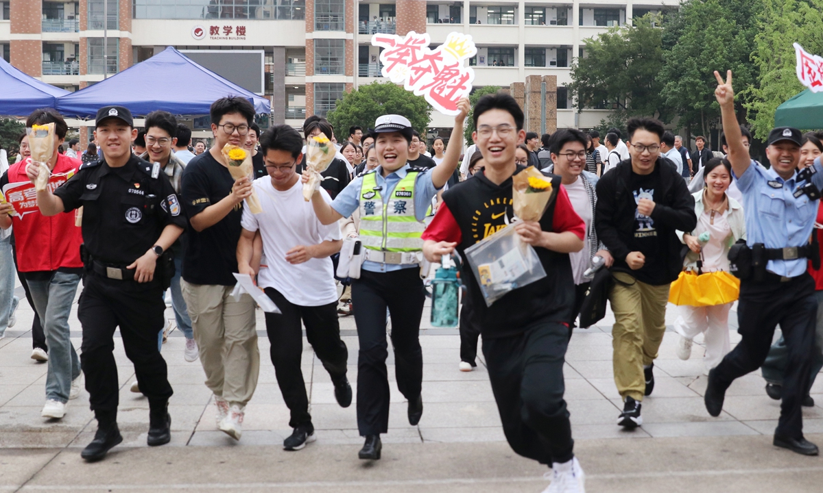 After completing this year's <em>Gaokao</em>, China's annual national college entrance examination, students happily leave the exam hall in a school in Wuhu, East China's Anhui Province on June 9, 2025. Photo: VCG
