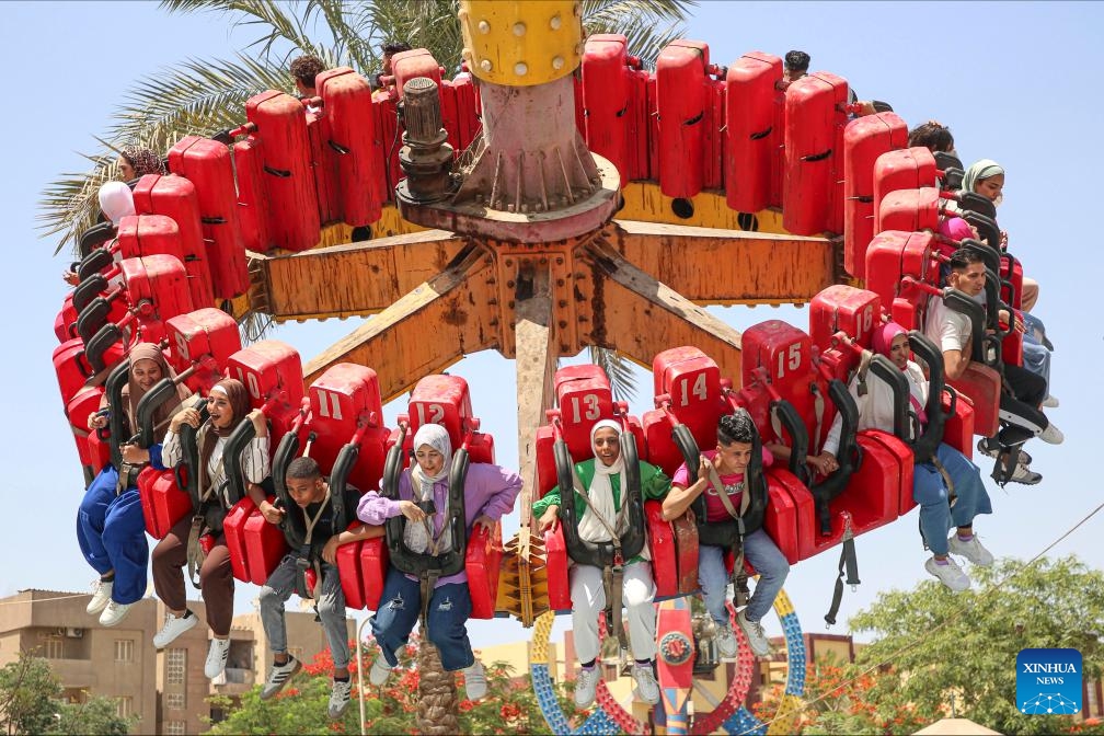 People have fun at an amusement park during the Eid al-Adha holiday in Cairo, Egypt, on June 8, 2025. (Photo: Xinhua)