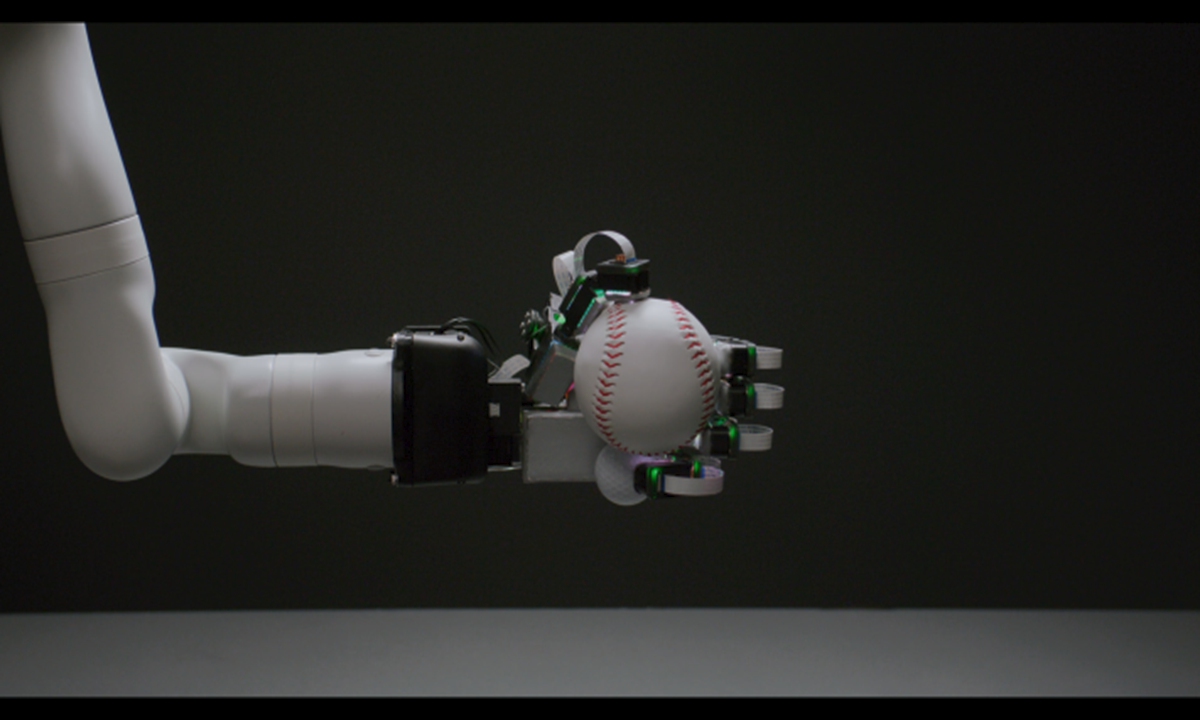 World's first robotic hand system that combines full-hand high-resolution tactile perception with complete motion capabilities - the F-TAC Hand. Photo: People's Daily