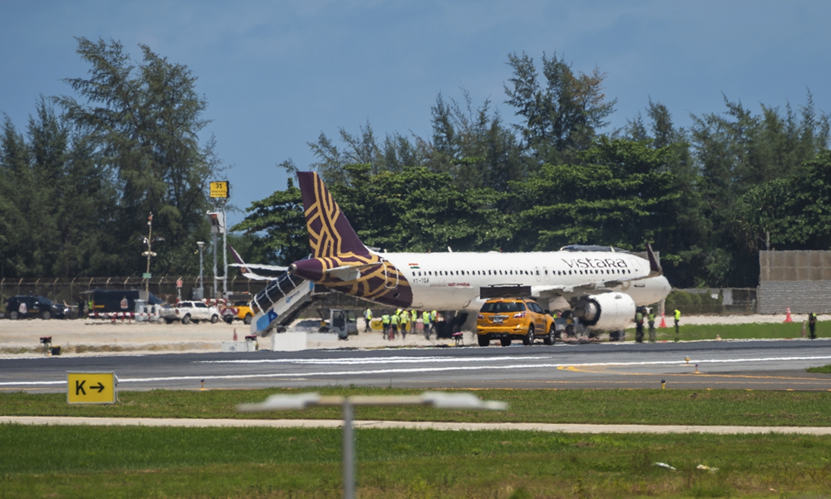 Air India flight AI 379, which was bound for New Delhi, is parked on the tarmac following an emergency landing back at Phuket Airport after it received a report that a pilot found a bomb threat message shortly after it took off from Phuket earlier on June 13, 2025. The incident occurred after an Air India flight to London with 242 people on board crashed on June 12. Photo: VCG