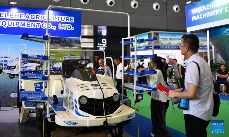 Visitors look at an agricultural machine during the fourth China-Africa Economic and Trade Expo at Changsha International Convention and Exhibition Center in Changsha, central China's Hunan Province, June 14, 2025. The fourth China-Africa Economic and Trade Expo opened Thursday in the central Chinese city of Changsha, highlighting the commitment of the world's largest developing country to strengthening ties with Africa, the continent with the largest number of developing nations. (Photo: Xinhua)