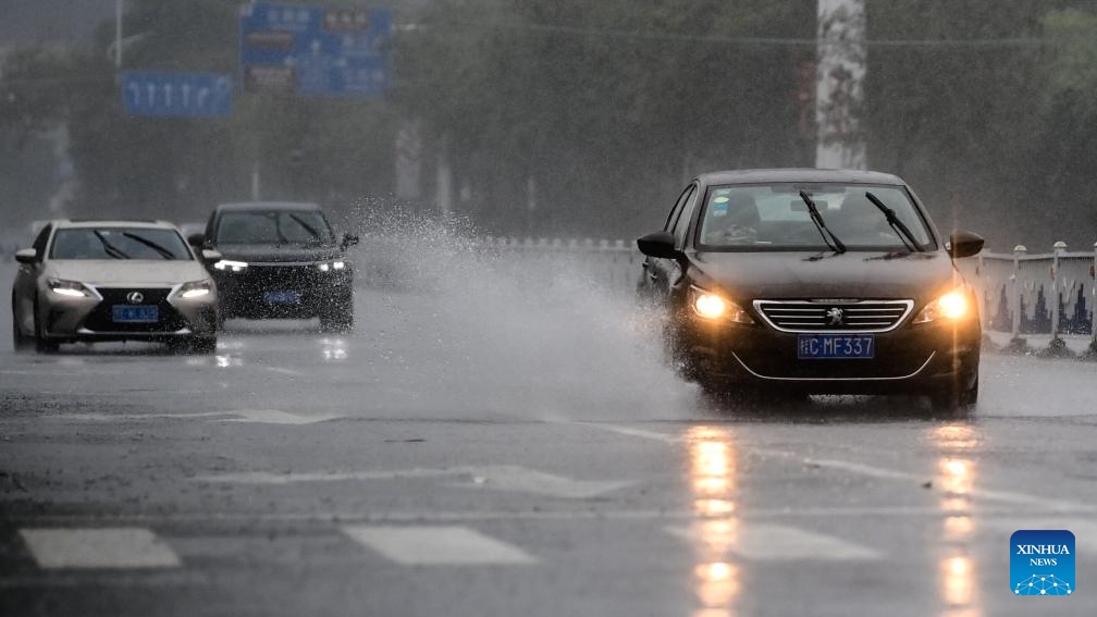 Vehicles run amid heavy rainfall in Beihai City, south China's Guangxi Zhuang Autonomous Region, June 14, 2025. Multiple Chinese authorities convened on Saturday to put in place precautionary measures against Typhoon Wutip, the first typhoon of the year, which is expected to bring heavy rainfall to the southern parts of the country. (Photo: Xinhua)