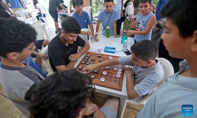 Participants compete in Xiangqi, a traditional Chinese board game also known as the Chinese chess, in Mount Lebanon, Lebanon, on June 14, 2025. An annual championship in Xiangqi was held here on Saturday. (Photo: Xinhua)