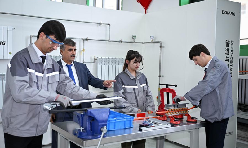 Students learn skills at the Luban Workshop in Dushanbe, Tajikistan, May 31, 2025. (Xinhua/Li Renzi)