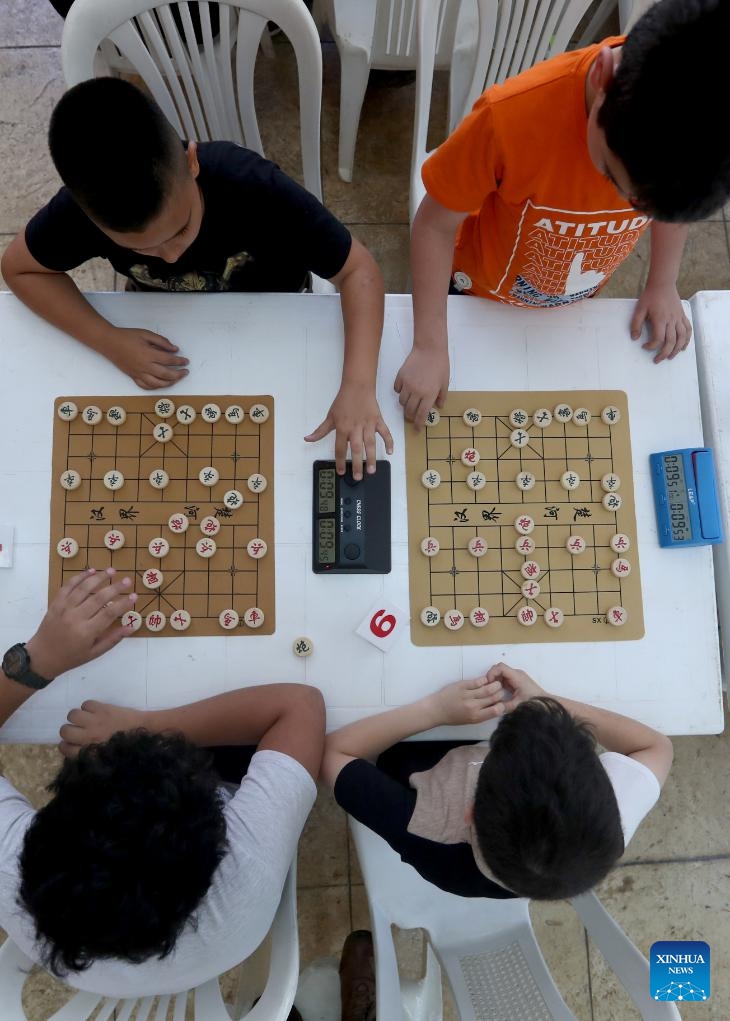 Participants compete in Xiangqi, a traditional Chinese board game also known as the Chinese chess, in Mount Lebanon, Lebanon, on June 14, 2025. An annual championship in Xiangqi was held here on Saturday. (Photo: Xinhua)