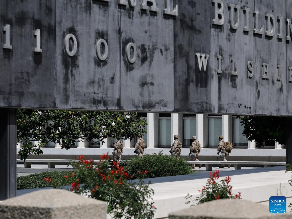 U.S. Marines are seen near the Wilshire Federal Building in Los Angeles, California, the United States, on June 13, 2025. About 200 U.S. marines have been deployed to Los Angeles, the second largest city in the United States, to protect a federal building there, the military said on Friday, after a week of protests over the current administration's immigration raids in the city. (Photo: Xinhua)