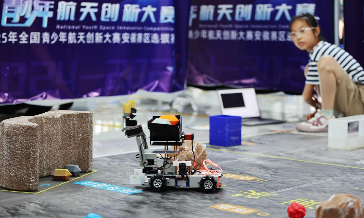 A contestant participates in a robot challenge in a provincial-level selection of the National Youth Space Innovation Competition 2025 in Hefei, East China's Anhui Province on June 15, 2025. The event provides teenagers with an opportunity to share their wisdom in aerospace innovation. Photo: VCG