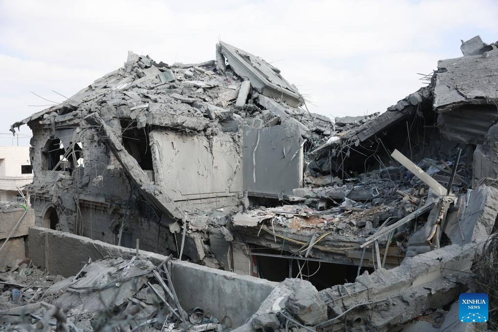A building damaged during Iranian missile strike is pictured in Tamra, Israel, June 15, 2025. The number of fatalities from a missile attack that hit Tamra, an Arab city in the North District of Israel, on Saturday night rose to four, according to the Magen David Adom (MDA) rescue service. They were identified as a mother and her two daughters and another relative. Dozens were injured. (Photo: Xinhua)