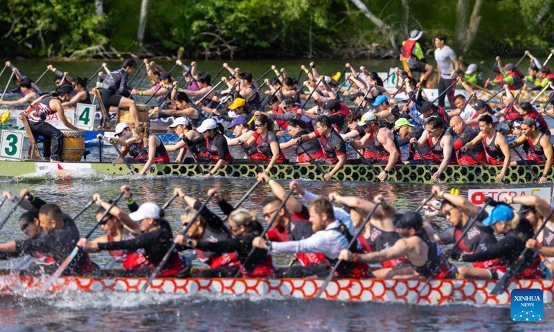 Participants compete during the 2025 Toronto International Dragon Boat Race Festival in Toronto, Canada, on June 14, 2025. (Photo: Xinhua)