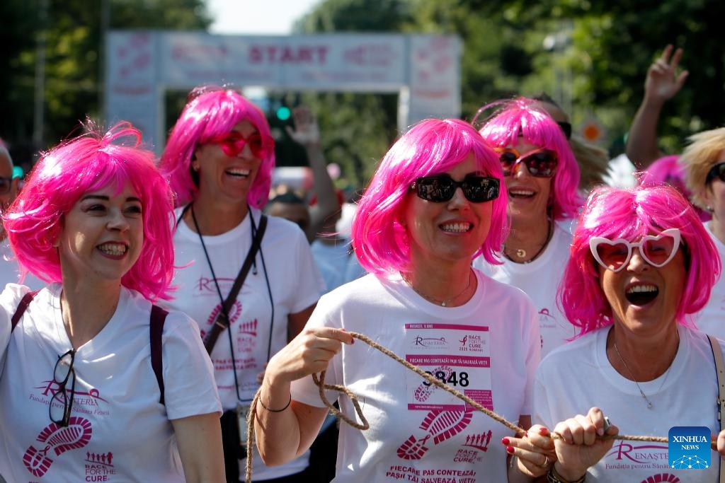 Participants run during the Race for the Cure, a part of an international fund-raising event aiming to fight breast cancer, in Bucharest, Romania, June 15, 2025. (Photo: Xinhua)