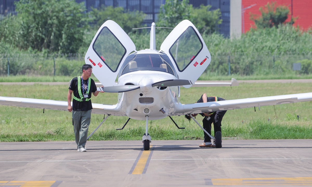 Maintenance crew members carry out production test flight inspections for the Lingyan AG100 aircraft at an airport in Huzhou, East China's Zhejiang Province on June 17, 2025. The aircraft is a civilian primary trainer specifically developed for the global flight training market, primarily used for the initial flight training of civil aviation pilots. The model has entered mass production and delivery, with plans to obtain 10 aircraft orders and deliver seven aircraft within the year.
Photo: VCG