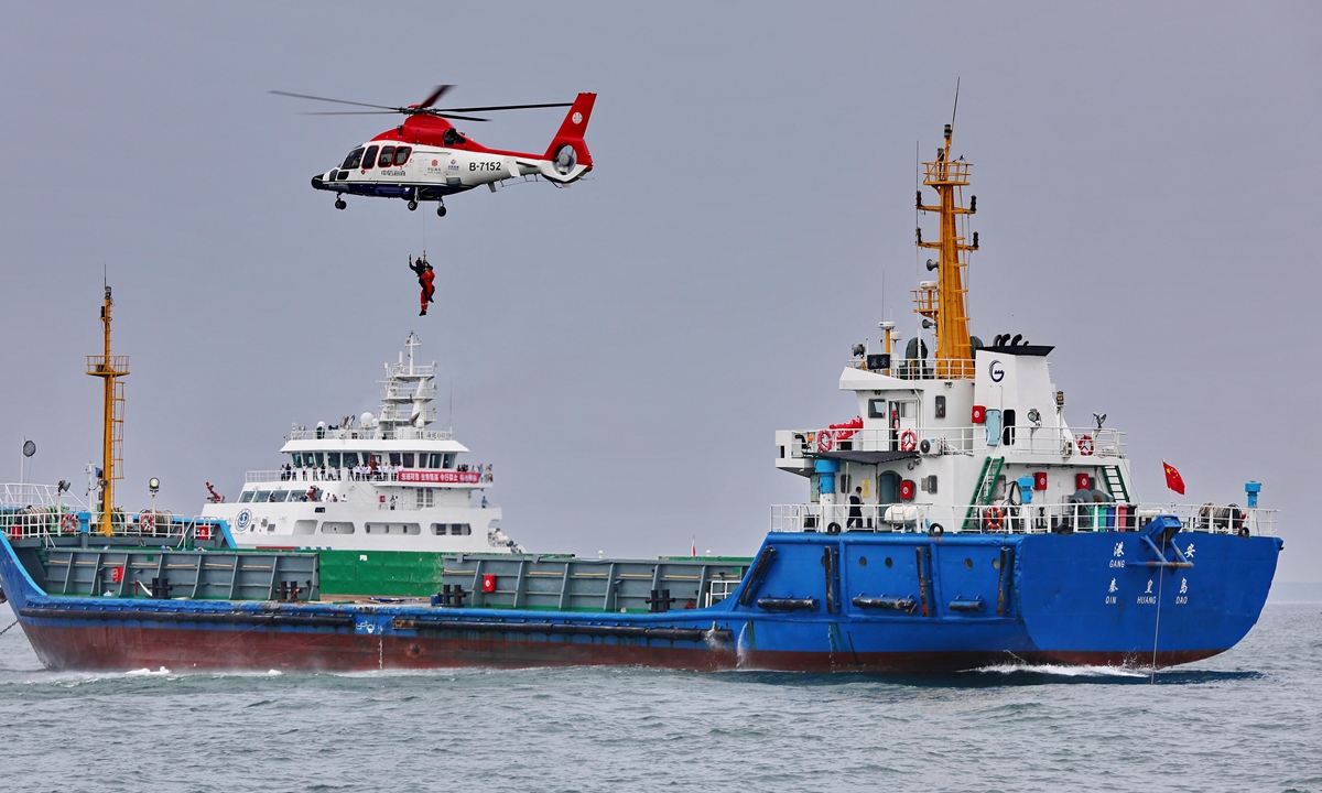 A vessel conducts an emergency rescue drill for helicopters during the 