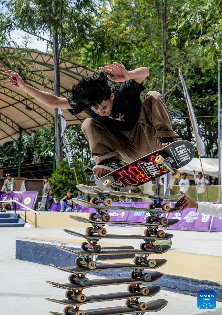 A boy performs a trick with his skateboard to celebrate the annual Go Skateboarding Day event in Palu, Central Sulawesi, Indonesia, on June 21, 2025. (Photo: Xinhua)