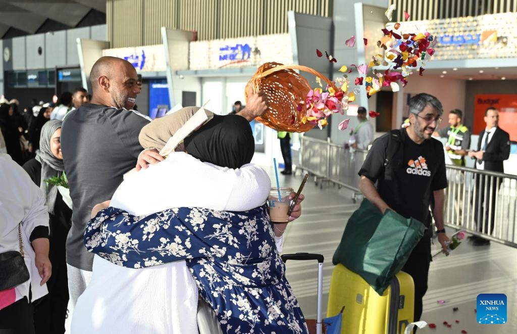 People evacuated from Iran are welcomed at Kuwait International Airport in Farwaniya Governorate, Kuwait, June 21, 2025. The first batch of Kuwaiti citizens evacuated from Iran via Turkmenistan arrived in Kuwait on Saturday morning, as part of the ongoing efforts made by the Kuwait's Ministry of Foreign Affairs. (Photo: Xinhua)