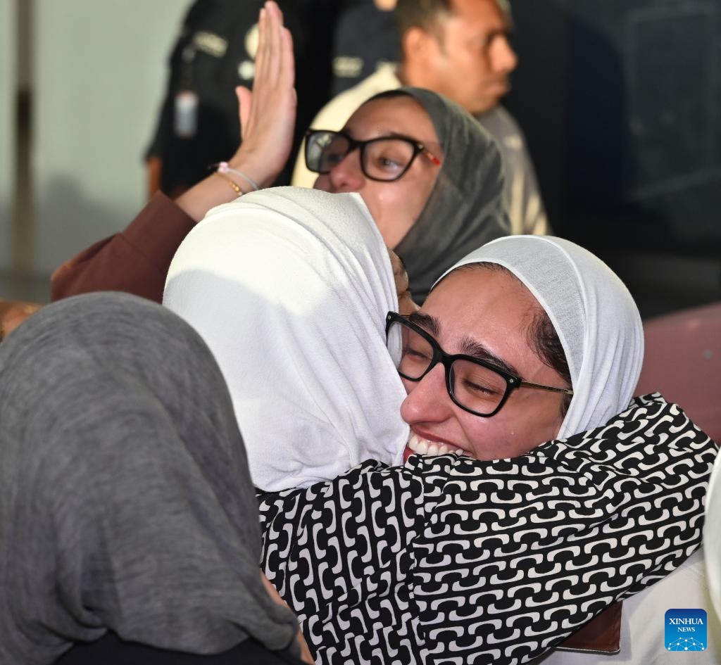 People evacuated from Iran are welcomed at Kuwait International Airport in Farwaniya Governorate, Kuwait, June 21, 2025. The first batch of Kuwaiti citizens evacuated from Iran via Turkmenistan arrived in Kuwait on Saturday morning, as part of the ongoing efforts made by the Kuwait's Ministry of Foreign Affairs. (Photo: Xinhua)