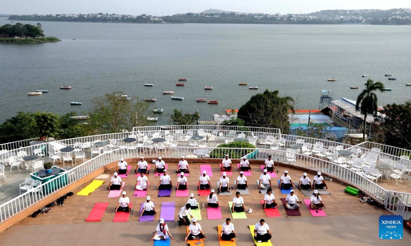 People perform Yoga to mark the International Yoga Day in Bhopal, the capital city of India's Madhya Pradesh state, June 21, 2025. (Photo: Xinhua)