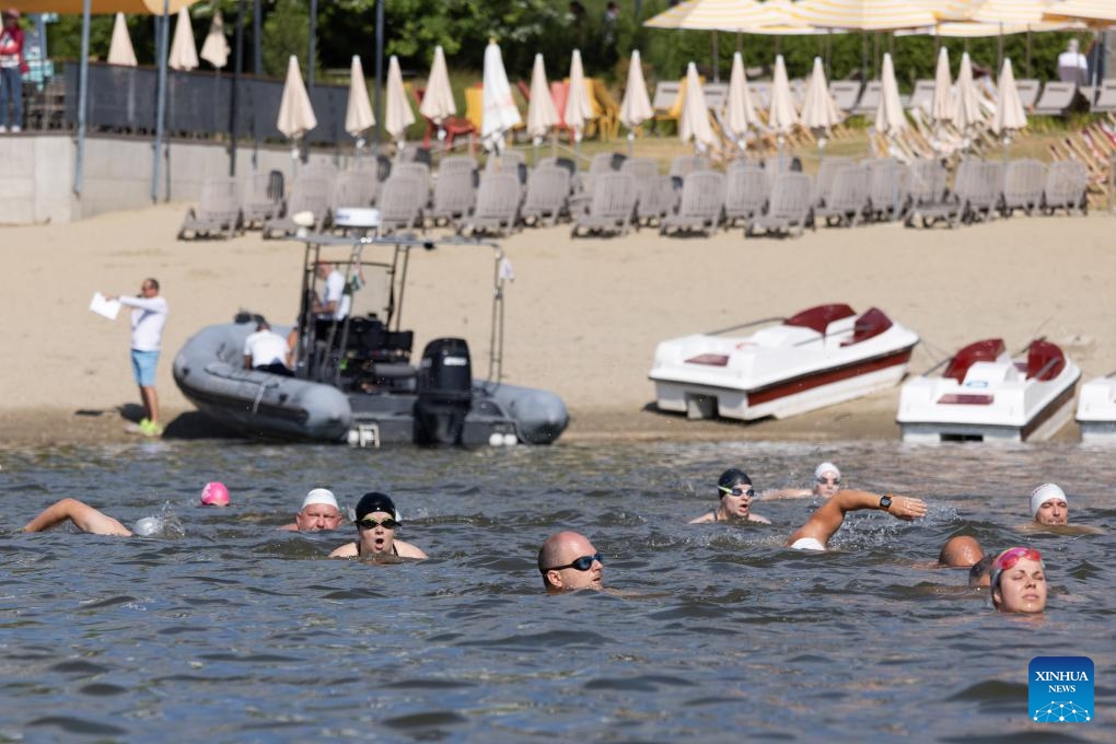 Participants swim across the bay at Buda Beach in Budapest, Hungary on June 21, 2025. (Photo: Xinhua)