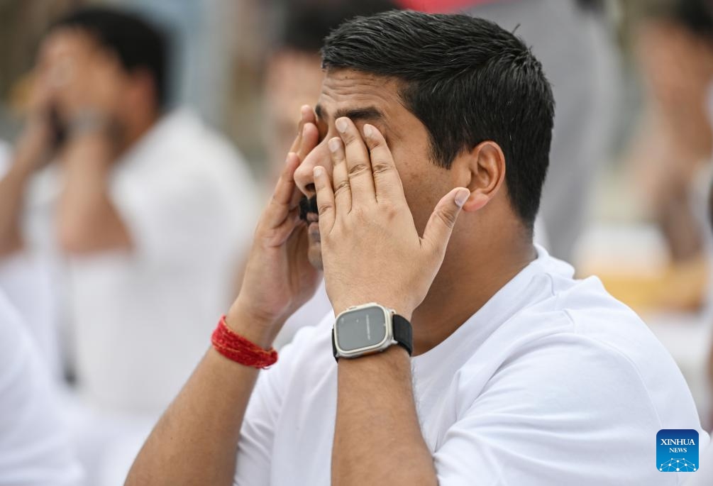 A man performs Yoga to mark the International Yoga Day in Srinagar city, the summer capital of Indian-controlled Kashmir, June 21, 2025. (Photo: Xinhua)