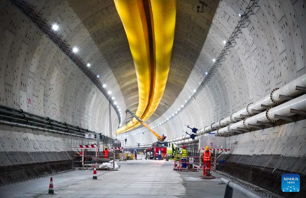 Staff workers work at the construction site of the Yellow River tunnel on Huanggang Road in Jinan, east China's Shandong Province, June 22, 2025. The excavation work of the Yellow River section of the Huanggang Road Yellow River tunnel was completed on Sunday, marking a breakthrough in the construction of the tunnel project. The 5,755-meter-long tunnel, with 3,290 meters excavated by a 17.5-meter diameter TBM, is the largest underwater TBM tunnel currently under construction in the world. (Photo: Xinhua)