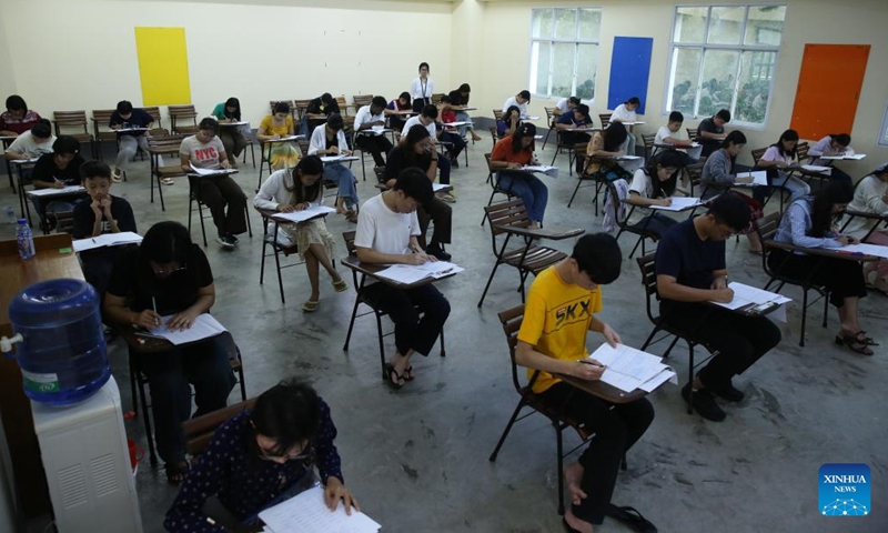 Students take the Hanyu Shuiping Kaoshi (HSK), or the Chinese Proficiency Test, at Myanmar's Yangon University in Yangon, Myanmar, June 22, 2025. The test organized by the Le Hua International Education Center was conducted at Myanmar's prestigious Yangon University for the first time on Sunday. A total of 200 students from Chinese language schools across the country sat for the exam, taking levels from HSK 1 to HSK 6. (Photo: Xinhua)
