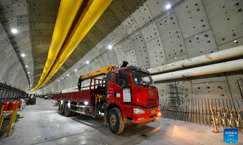 A truck runs at the construction site of the Yellow River tunnel on Huanggang Road in Jinan, east China's Shandong Province, June 22, 2025. The excavation work of the Yellow River section of the Huanggang Road Yellow River tunnel was completed on Sunday, marking a breakthrough in the construction of the tunnel project. The 5,755-meter-long tunnel, with 3,290 meters excavated by a 17.5-meter diameter TBM, is the largest underwater TBM tunnel currently under construction in the world. (Photo: Xinhua)