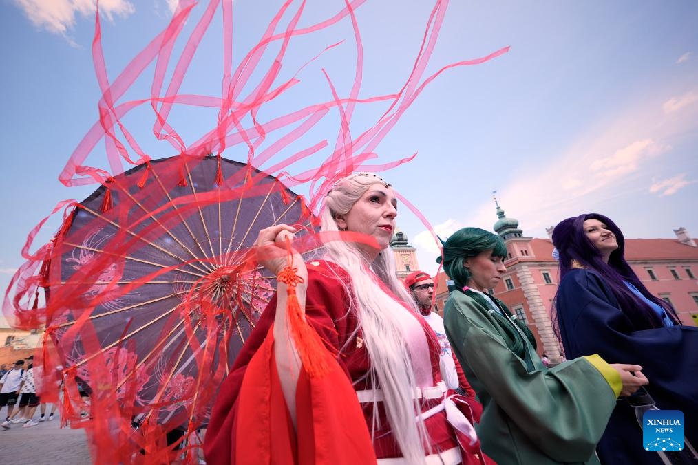 Cosplayers are pictured during the Warsaw Cosplay Walk event in the Old Town of Warsaw, Poland, June 21, 2025. (Photo: Xinhua)