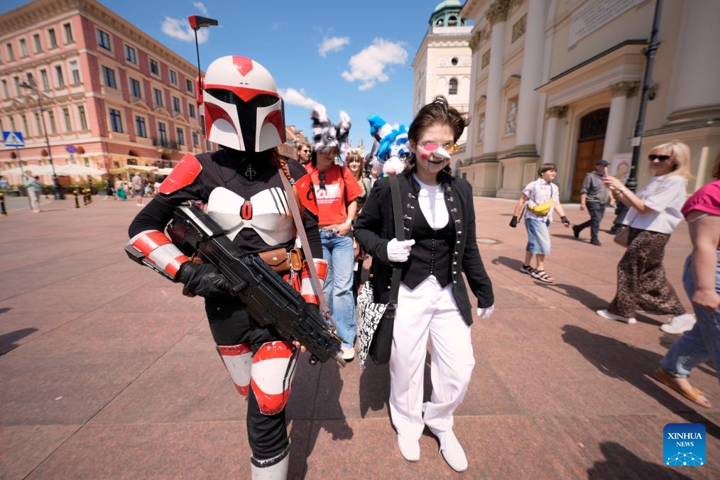 Cosplayers are pictured during the Warsaw Cosplay Walk event in the Old Town of Warsaw, Poland, June 21, 2025. (Photo: Xinhua)