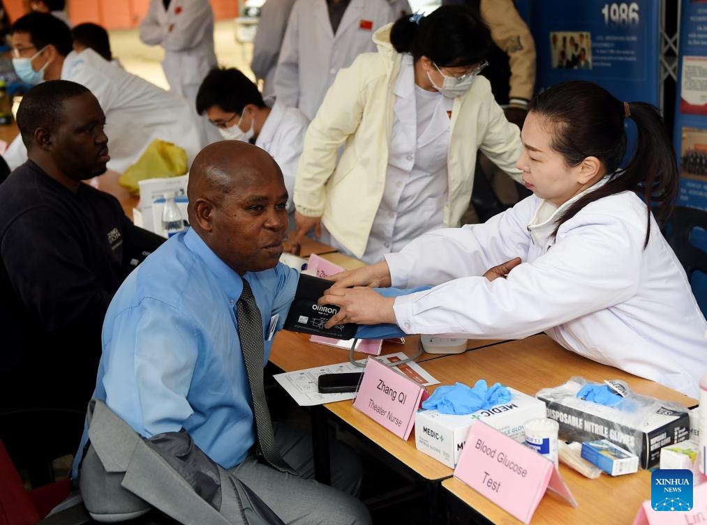 Members of the 17th batch of the Chinese medical team in Botswana provide free consulting service at the SOS Children's Village in Tlokweng, on the outskirts of Gaborone, Botswana, June 22, 2025. The 17th batch of the Chinese medical team in Botswana on Sunday conducted a free medical outreach service and made donations here. (Photo: Xinhua)