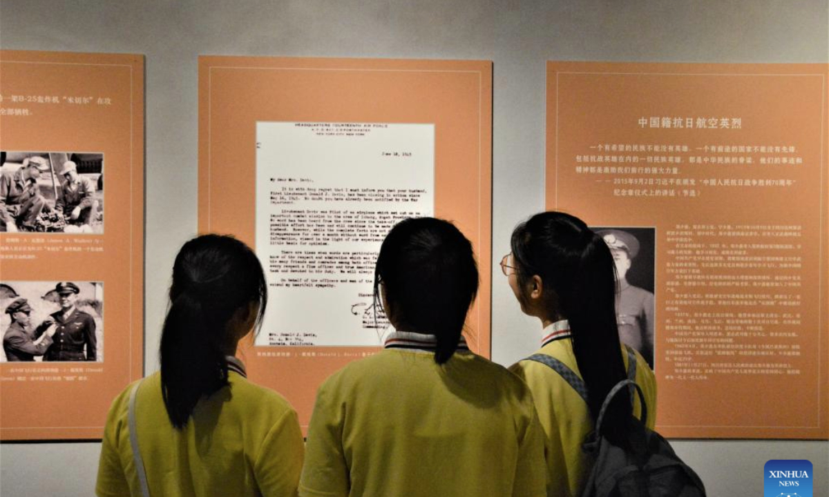 Students of Lianjiang No.1 Middle School of Fujian visit Remembering Heroes: The Flying Tigers Historical Photo Exhibition at Fujian Museum in Fuzhou, southeast China's Fujian Province, June 24, 2025. The exhibition opened here on Tuesday, showcasing hundreds of valuable photos contributed by veterans of the Flying Tigers, as well as other items of historic significance. (Xinhua/Li Haoze)