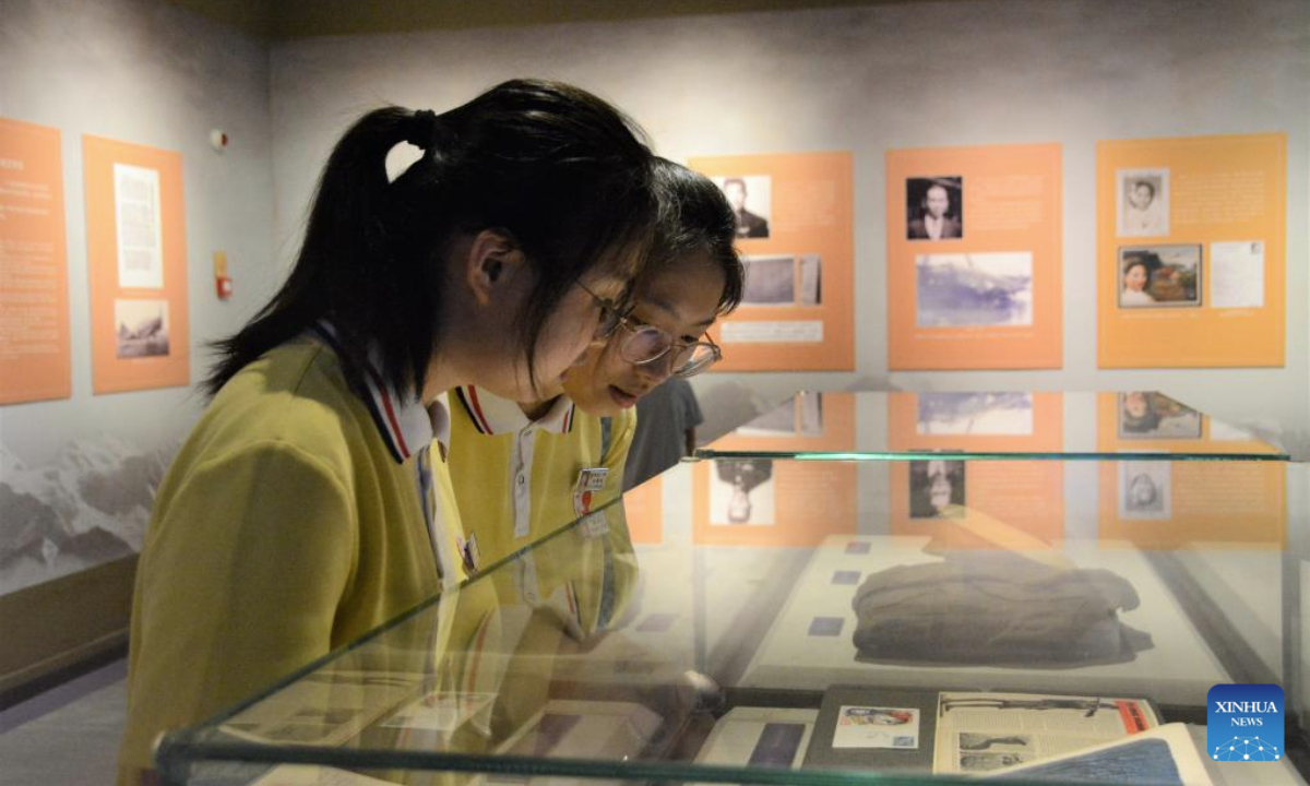 Students of Lianjiang No.1 Middle School of Fujian visit Remembering Heroes: The Flying Tigers Historical Photo Exhibition at Fujian Museum in Fuzhou, southeast China's Fujian Province, June 24, 2025. The exhibition opened here on Tuesday, showcasing hundreds of valuable photos contributed by veterans of the Flying Tigers, as well as other items of historic significance. (Xinhua/Li Haoze)
