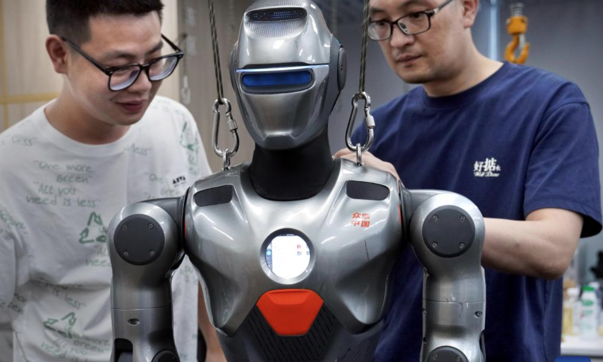Staff members debug a humanoid robot at a robot company in Shenzhen, south China's Guangdong Province, June 25, 2025. In recent years, Guangdong Province has taken various measures to develop the robot industry. The application and promotion of embodied artificial intelligence robots has been gaining speed in Guangzhou and Shenzhen, and a provincial embodied artificial intelligence robot innovation center was established in Shenzhen. In addition, cities like Foshan, Dongguan and Zhuhai are encouraged to give full play to their manufacturing advantages to build robot production bases.

Guangdong's industrial robot output exceeded 240,000 units in 2024 with a year-on-year increase of 31.2 percent, ranking first in the country for five consecutive years, according to the Department of Industry and Information Technology of Guangdong Province. (Xinhua/Li An)