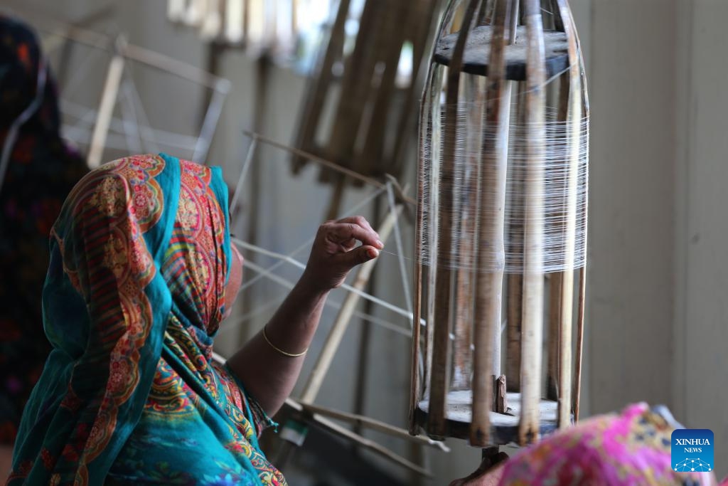 A weaver works at a muslin workshop in Dhaka, Bangladesh, on May 24, 2025. Bangladesh is undertaking a national effort to revive its legendary Dhaka muslin fabric, once hailed as woven air for its ethereal lightness and intricate craftsmanship during the Mughal era. (Photo: Xinhua)